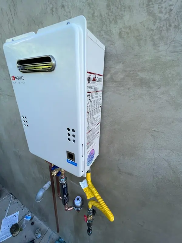 Tankless water heater installation for West Street - River Street homes